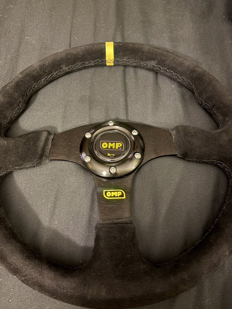 ribsauce's tweet image. Amazon is basically Ali Express now. This OMP wheel is fake as hell. Alcantara feels like crap. Logo is crooked. Awful.