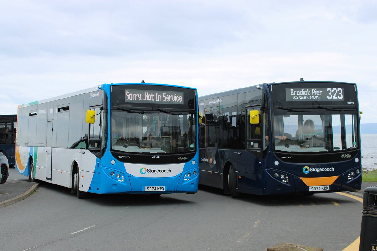 ScottishSoloFan's tweet photo. The eVoRa takeover on Arran! Some of the recent transfers seen in Blackwaterfoot. 'Steel Blue'/SPT Branded 21433 SD74 KRK on a 323 to Brodick via the South and 21434 SD74 KRN on a 324 to Brodick via the North. 'Local' liveried 21438 SD74 KRX having finished a 324 from Brodick. https://t.co/wnkgJ3GEGV