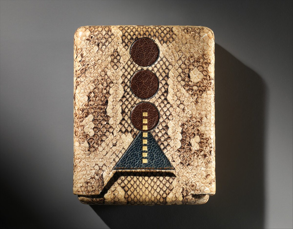 HistorylandHQ's tweet image. Snakeskin cigarette case designed by Pierre Legrain, French, c. 1925. [3915x3065]