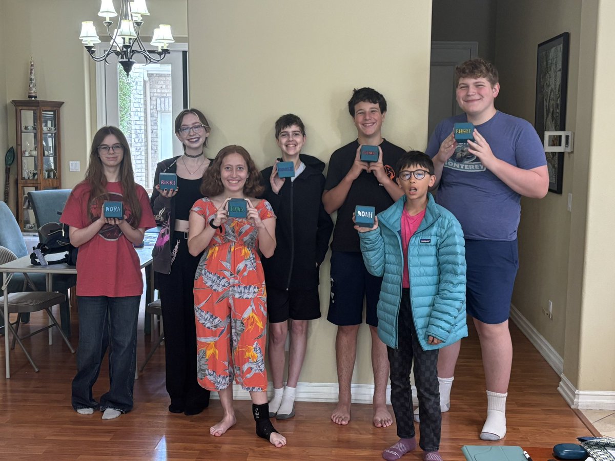 DanaFischerMTG's tweet photo. It’s time for Magic Camp to begin! We have all the campers with their custom deck box courtesy of @kanigut ! 

From left to right: Nora, Rikki, me, Charlie ( @boros83158 ), Cormac, Noah, &amp; Robbie.

Camp intro video: https://t.co/O9zJzHymdL w/ much more to come!

@wizards_magic https://t.co/D8uqE5QgHA