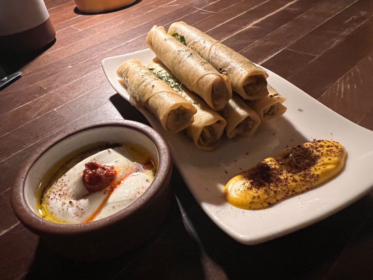 thomasmannfacts's tweet image. Anixi in chelsea is kind of next level...lamb cigar rolls with labneh, chicken gyro rolls, taramasalata with seaweed caviar, warm fresh herbed bread, ALL VEGAN