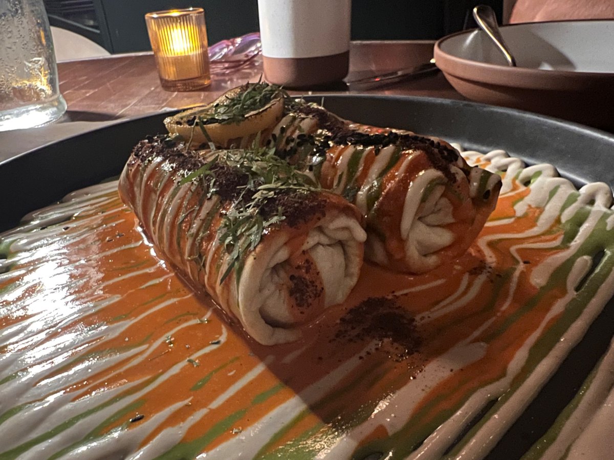 thomasmannfacts's tweet image. Anixi in chelsea is kind of next level...lamb cigar rolls with labneh, chicken gyro rolls, taramasalata with seaweed caviar, warm fresh herbed bread, ALL VEGAN