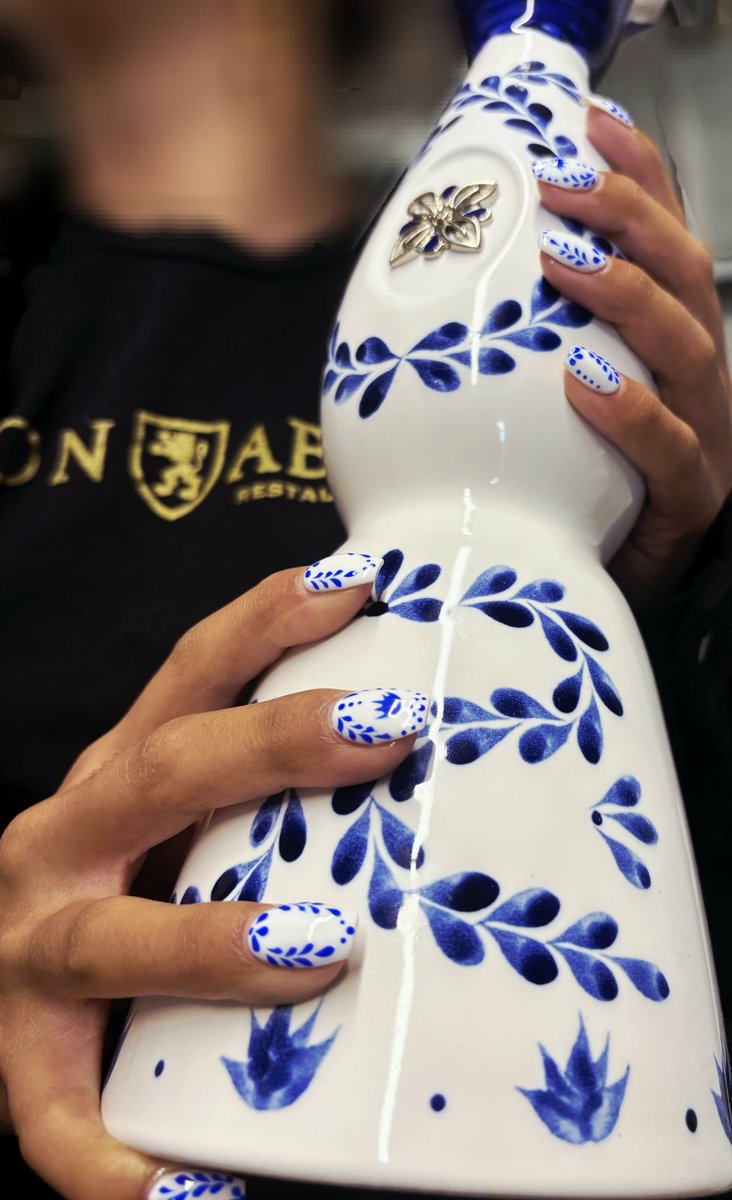 TheIronAbbey's tweet photo. If you aren't getting your nails to match your favorite tequila bottle, then what are you doing? 🤔 👀 nails done by @stknailswarminster https://t.co/Bz5Ei2nTY2