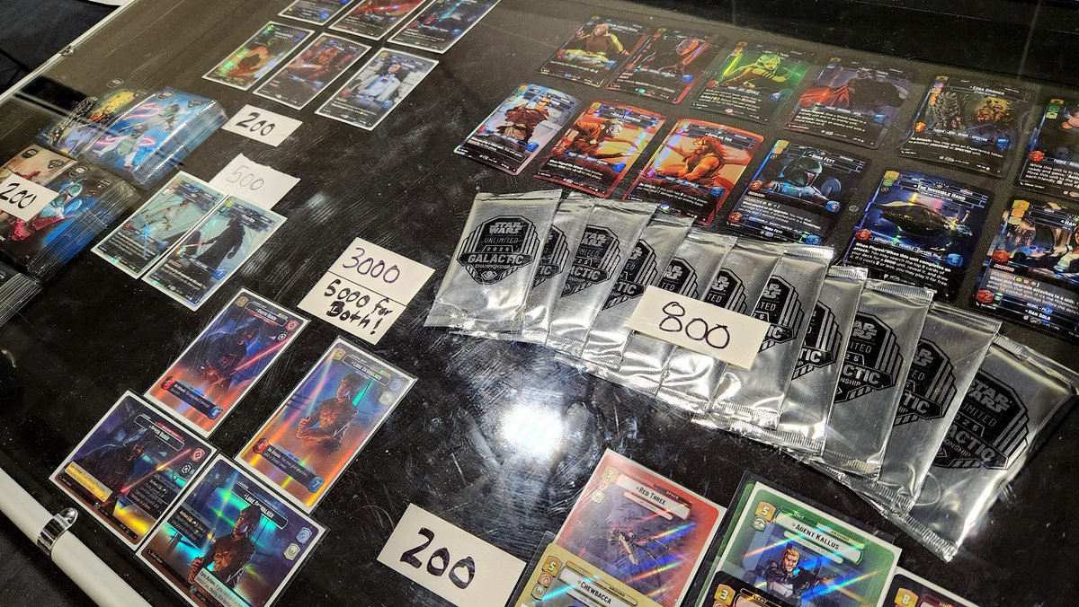 MaindeckGames's tweet image. So many amazing souvenirs to walk home with from the #StarWarsUnlimited Galactic Championship!! Incredible artwork, treatments, merch, and a great variety of vendors on site!