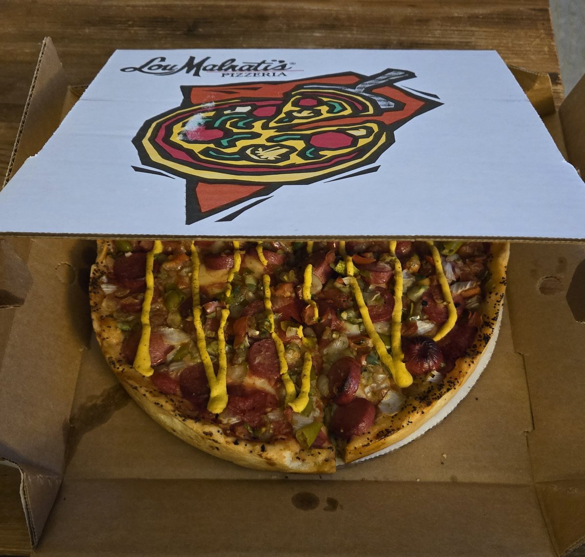 🍕 <a href="/LouMalnatis/">Lou Malnati's Pizza</a> and <a href="/portilloshotdog/">Portillo's</a> have collabed for a Chicago Dog Deep Dish and the results are delicious