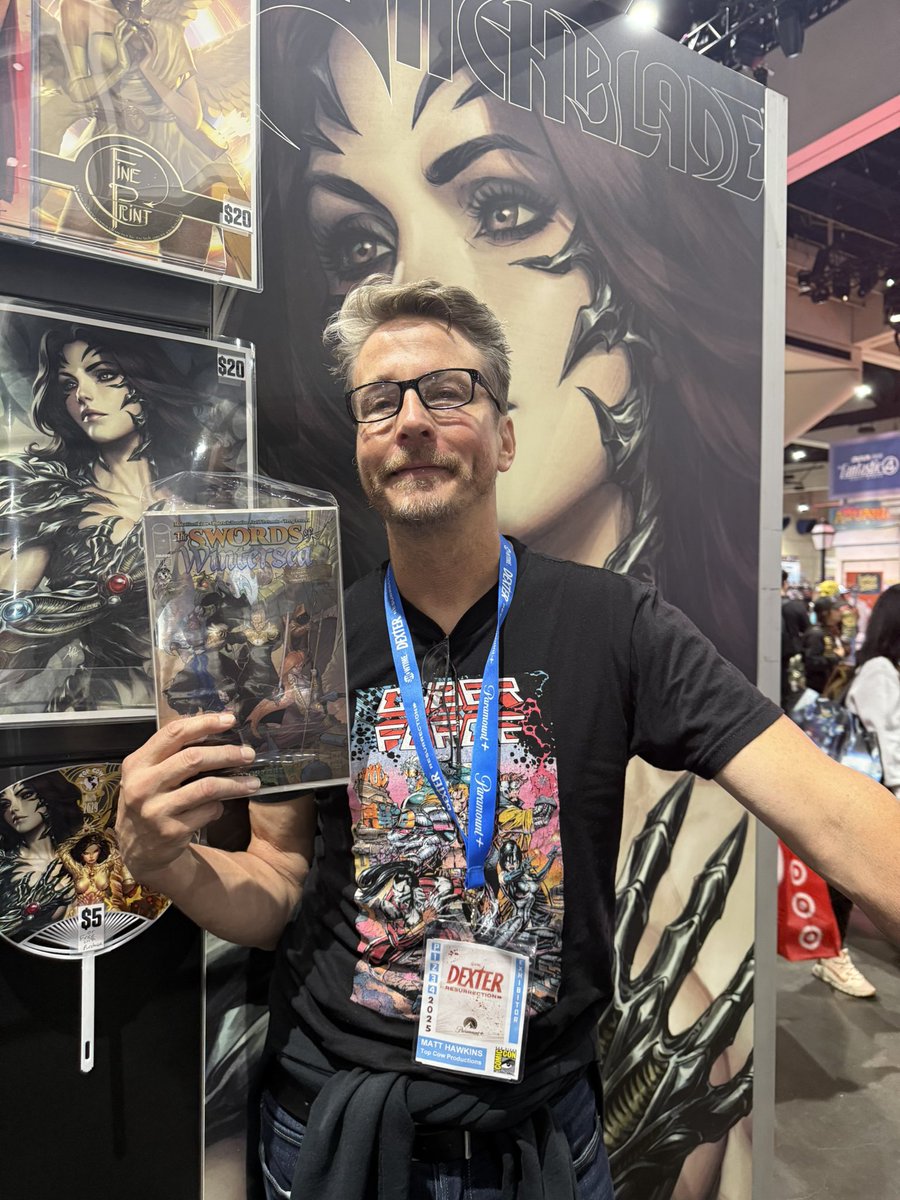 Top Cow (@topcow) on Twitter photo 🗡️ <a href="/topcowmatt/">Matt Hawkins</a> shows off THE SWORDS OF WINTERSEA Spot Foil Flipbook! Based on his 40-yr D&D campaign—includes a full playable 5E module! 🎲 Grab this exclusive at his signings:
• Sun 11–2
#SDCC #TopCow #DND #Comics 🗡️ <a href="/topcowmatt/">Matt Hawkins</a> shows off THE SWORDS OF WINTERSEA Spot Foil Flipbook! Based on his 40-yr D&D campaign—includes a full playable 5E module! 🎲 Grab this exclusive at his signings:
• Sun 11–2
#SDCC #TopCow #DND #Comics