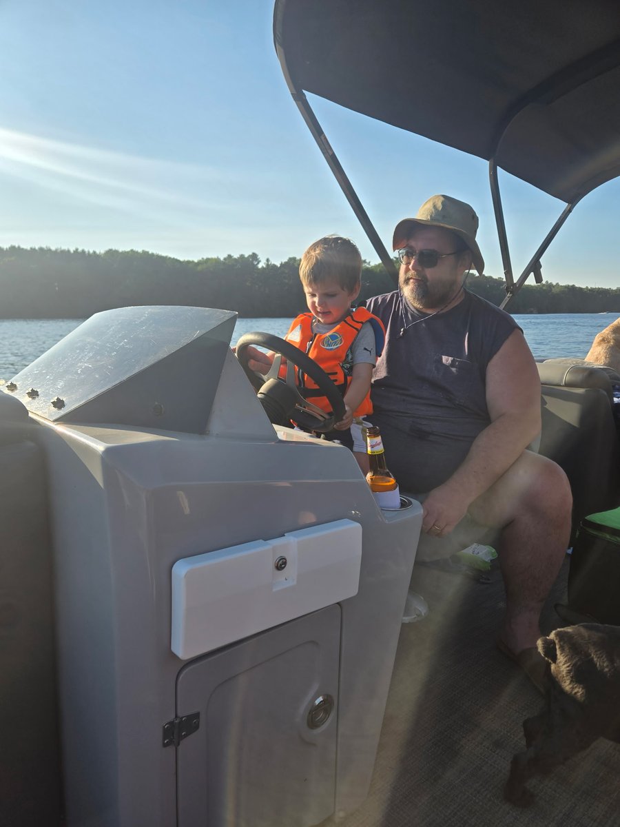 Bud driving the yacht