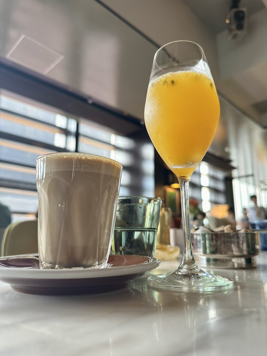 ThatoD01's tweet image. Breakfast drinks photography. We wake the system with water, a latte and a Bellini.
