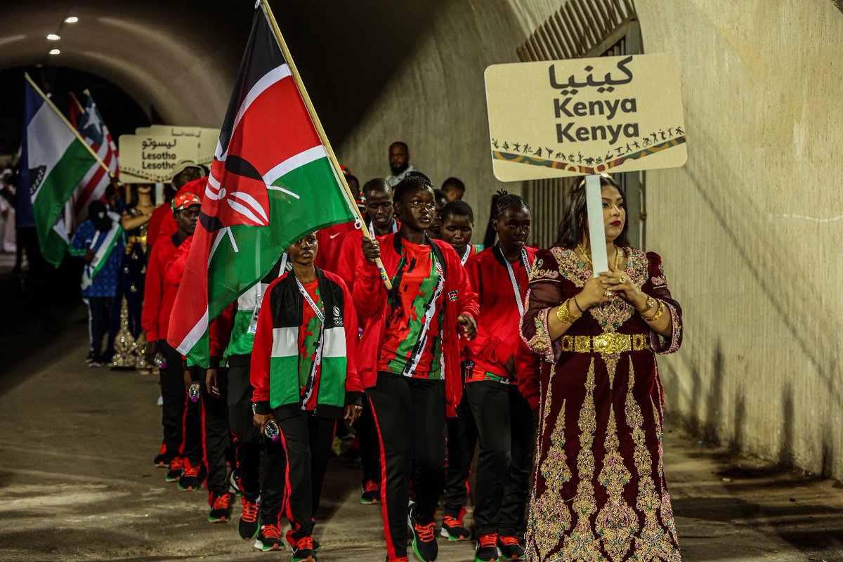 KenyaBoxing's tweet photo. Flagbearer Sonia Atieno leads the Kenyan team at the opening ceremony of the inaugural African School Games at the 19 May 1956 Stadium, Annaba. 

Sonia Atieno and 13-year-old Lukeman Shaffi will be representing Kenya in the sport of boxing, which is among 25 sports at the event. https://t.co/X2CKxrL9h7