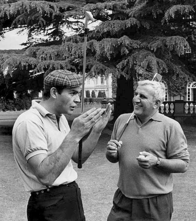 NevilleFChambe1's tweet image. Sean Connery and Adolfo Celi enjoy a game of golf in the gardens at @PinewoodStudios during a break in filming the #JamesBond film “THUNDERBALL” (1965)