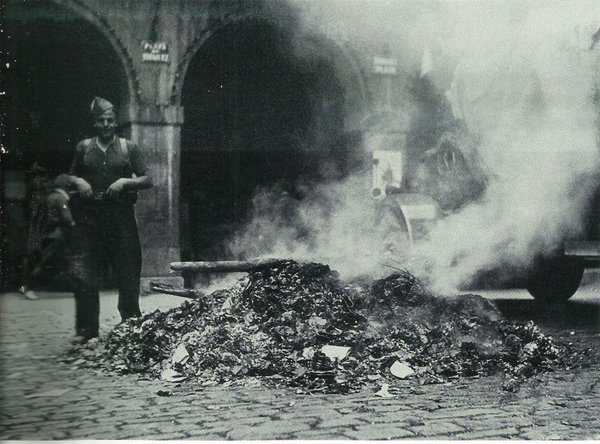 The burning of Basque language and liberal+ leftist books by Francoist conquerors, Tolosa, Basque Country. 11 August 1936. Standard auto-de-fe ceremony, arms outstretched, in town after town across Spain. anything "Jewish-Masonic-Marxist-Separatist" or just novels by Tolstoy, etc