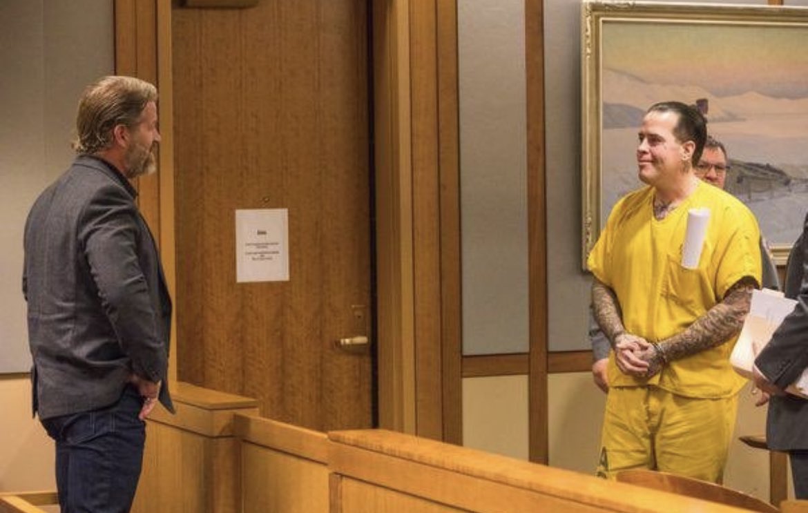 "The Alaskan Avenger" Jason Vukovich smiling at his brother after receiving a 23 year sentence. Jason used the state's sex offender registry to track down offenders, break into their homes, and beat them with a hammer. Both Jason and his brother were sexually abused as children.