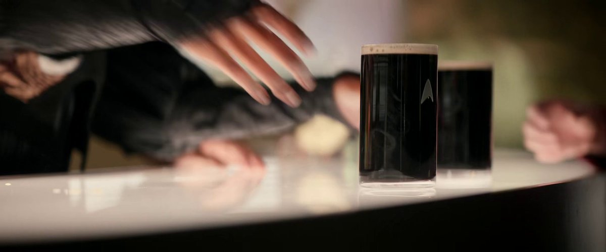 I can shrug off New Star Trek's obnoxious obsession with show lore but I will never forgive this recent scene where Young Scotty orders two pints of Guinness, gets served THIS flat-headed hate crime, and then Capt Pike hires the bartender to work full time on the Enterprise?!