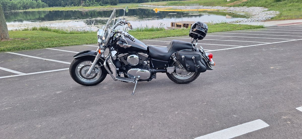 I spent some time yesterday washing and waxing my scooter. Been riding at night a lot and wet roads and rain. This bike doesn't look as old as it really is and it looks great. I need to do the wheels a little better.  Spokes are a pain.