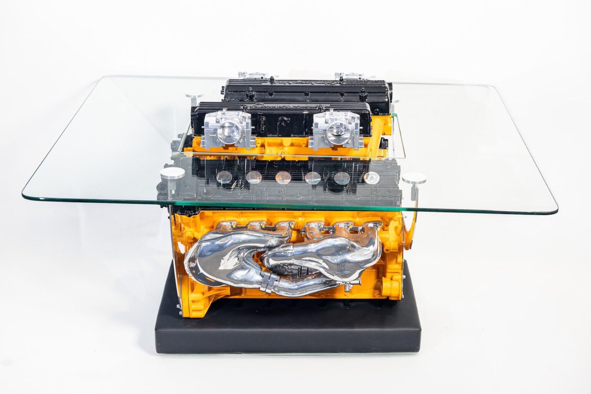 Silodrome's tweet image. This is a coffee table made from a real Lamborghini Murcielago V12. It has a half-inch-thick tempered glass table top with a cutout center section to allow the intake to rise through the middle.
Link: silodrome.com/lamborghini-mu…