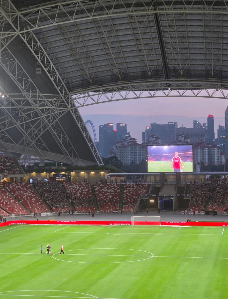 AFCFixtureNews's tweet image. Our new number 14 being introduced to the crowd in Singapore.
Photo: @stubbsy70