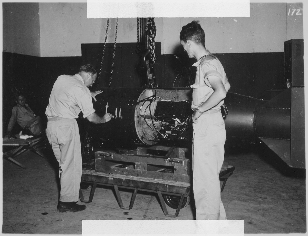 Iain_MacGregor1's tweet image. #OTD Tucked away in their heavily guarded section of the XX BG airbase, on the island of #Tinian in the Marianas chain, technicians from the #ManhattanProject begin stage 1 of the assembly of 'Little Boy' uranium gun-type bomb delivered by the USS Indianapolis. #TheHiroshimaMen