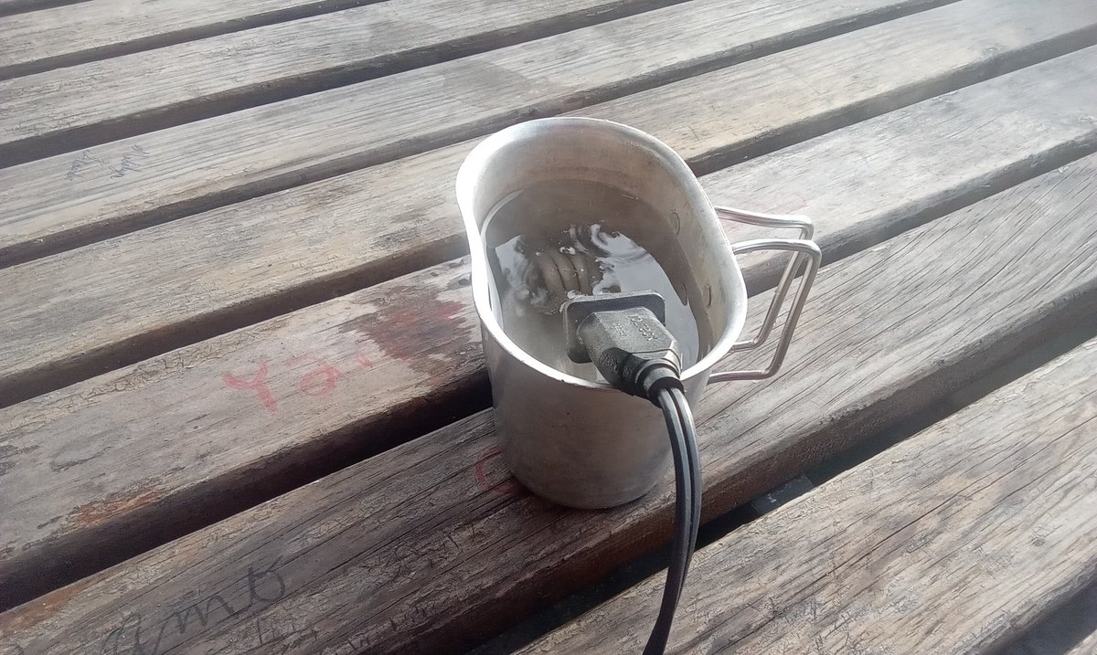 DissonantLogic's tweet image. "Morale in a Mug"
Steam hits the face like dawn-lit truth,
Bitter heat that humbles youth.
Cracked cup, chipped rim, still bold,
This warmth defies the world’s cold.
Dark roast clenched in weary hands,
Sip by sip, the soul withstands.
Luxury? No—this is war gear,
A quiet rite…