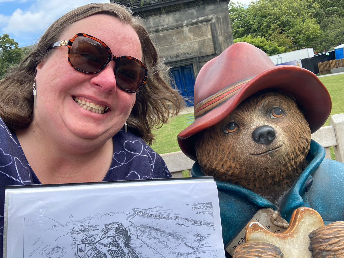RuthBoreham's tweet image. Arrived a bit early for my 2pm New Town tour so giving Paddington some info about the city he is sitting in 😁❤️