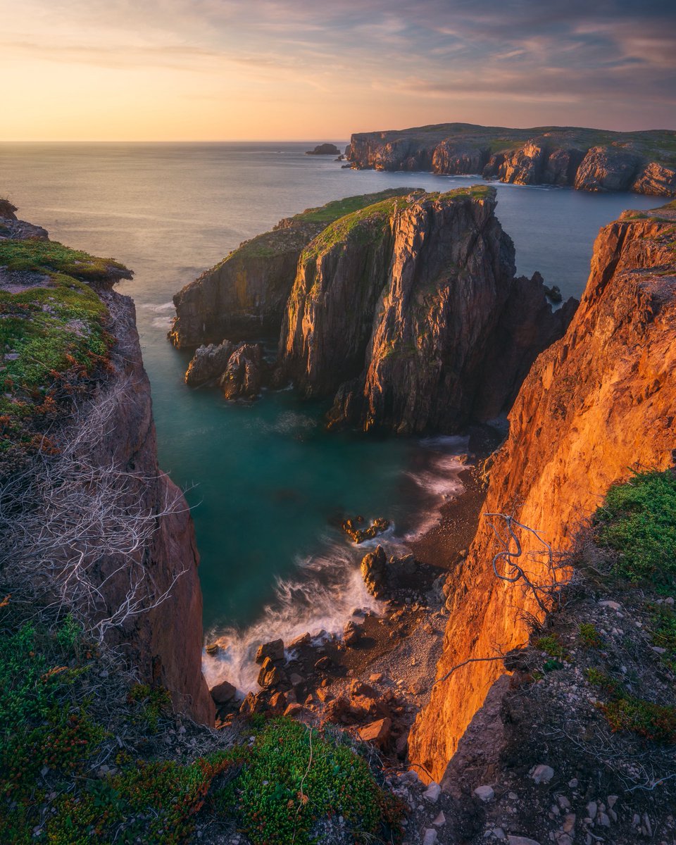 There is no shortage of interesting coastlines at Cable John Cove Newfoundland. Here is one of the views I found back in June. I love the framing of the rock. The beach below provides a nice leading leading line with some slow moving waves. The sun is still quite low creating
