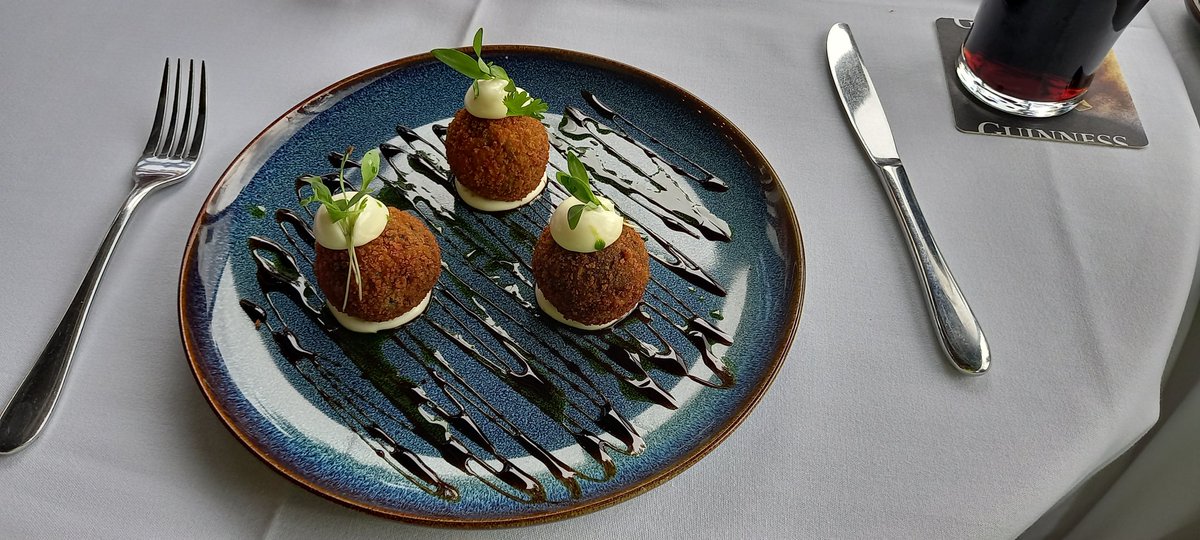 Out for lunch today, and a wonderful duck arancini to kick things off... Now, where might I be?