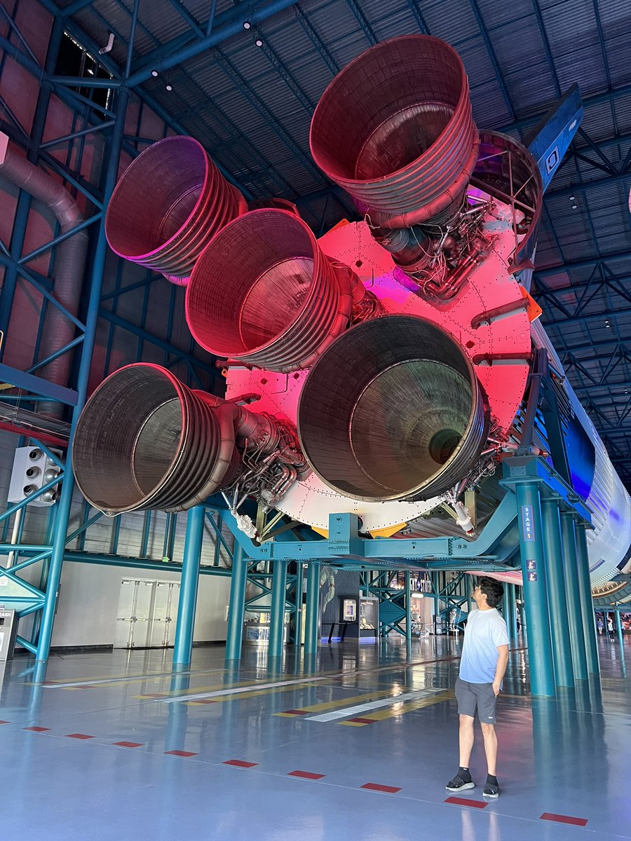 eigenron's tweet image. throwback to when i was literally right next to a fucking Saturn V!
those f-1 engines are the sexiest things i’ve seen in a hot minute.
the second picture is the stage-2 boosters, not the f1’s.