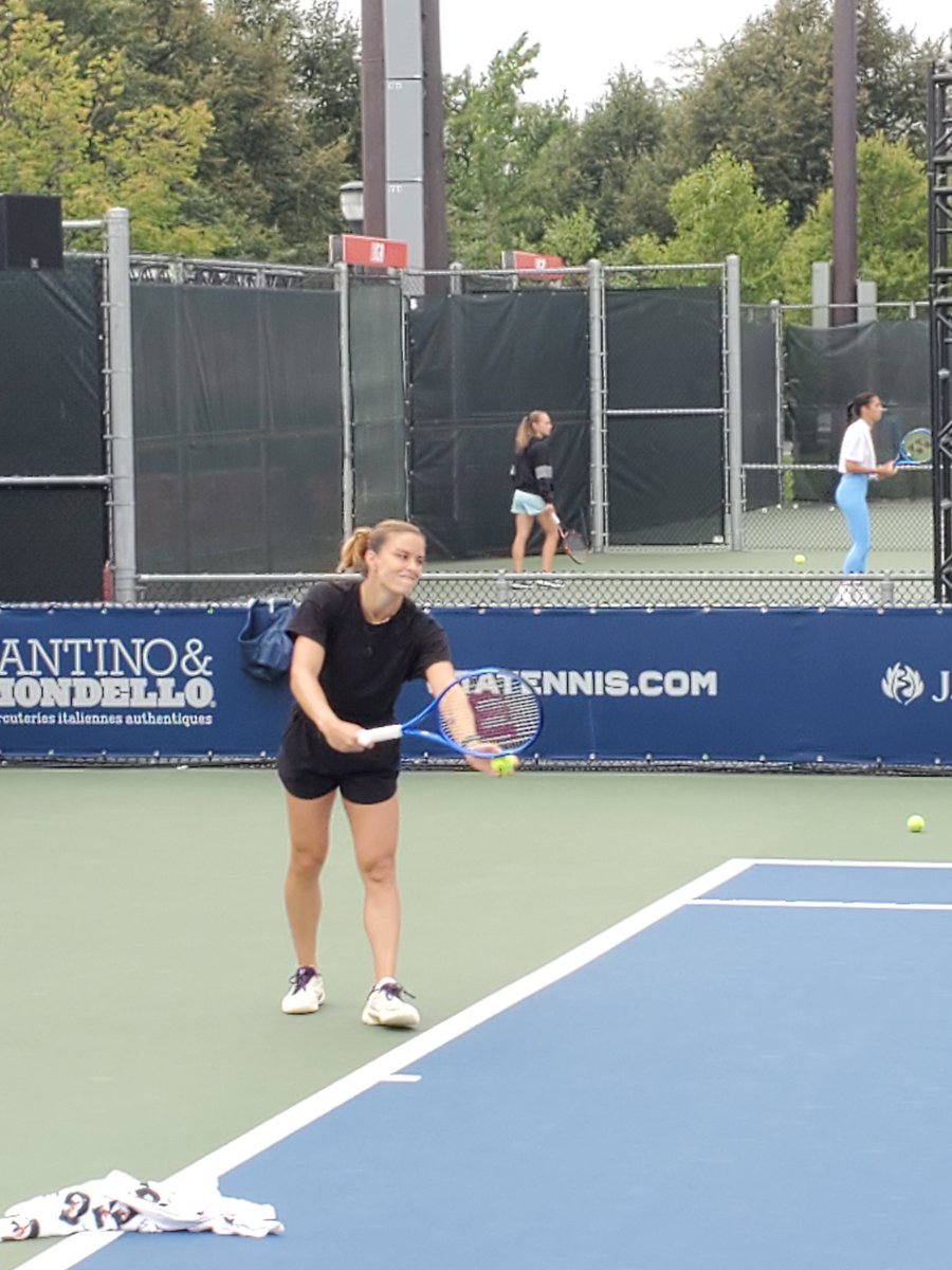 Variant488's tweet image. Maria practicing serves this morning amidst the raindrops.