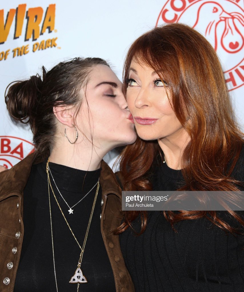 ElviraClips's tweet image. Cassandra Peterson, Elvira pictured with Francis Bean Cobain.
