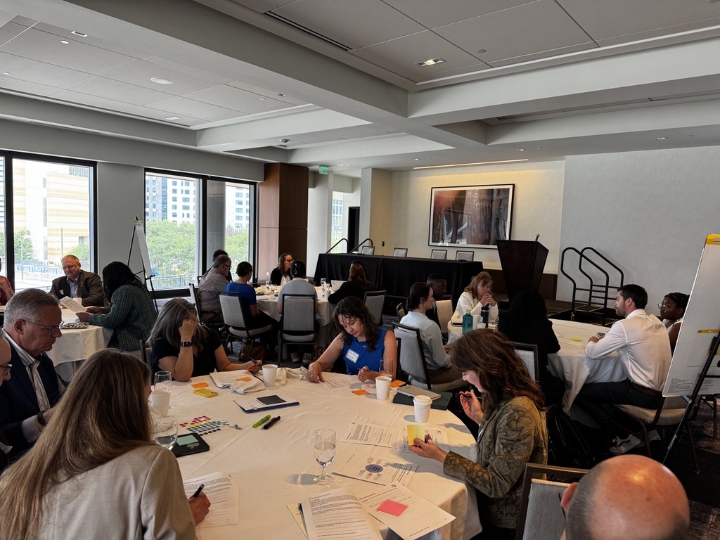 NARUC's tweet image. This morning, commissioners and commission staff joined the "Resilience in Practice" workshop to explore NARUC’s new framework, and craft strategies for stronger, smarter systems. #NARUCSUMMER25
