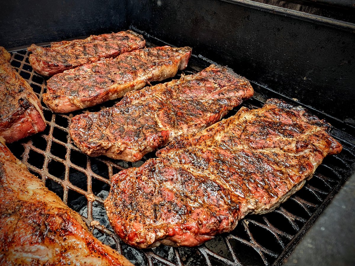 BBQBryan's tweet image. First flip on the pork steaks, 30 minutes at 325 degrees