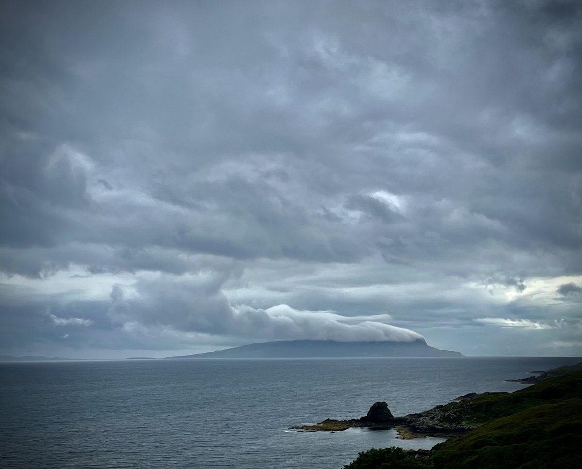InEilidh's tweet image. Moody grey skies over the Isle of #Eigg this afternoon, from #Sleat #Skye