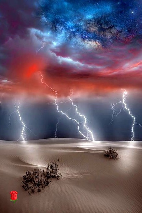 pelletierMario5's tweet image. blue and red clouds and lightning in the desert