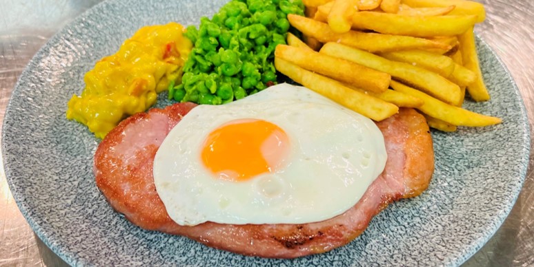 Notice to Members and people who could be members: Chef's mission to make Monday's Specials as superb in value as they are in flavour continues at the start of next week with Gammon Steak, Egg, Chips, Crushed Green Peas and Piccalilli, his dish of the day - all just £9. YUM!