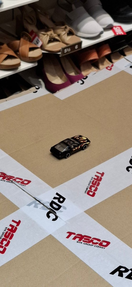 Someone left their HotWheel at a shoe store
