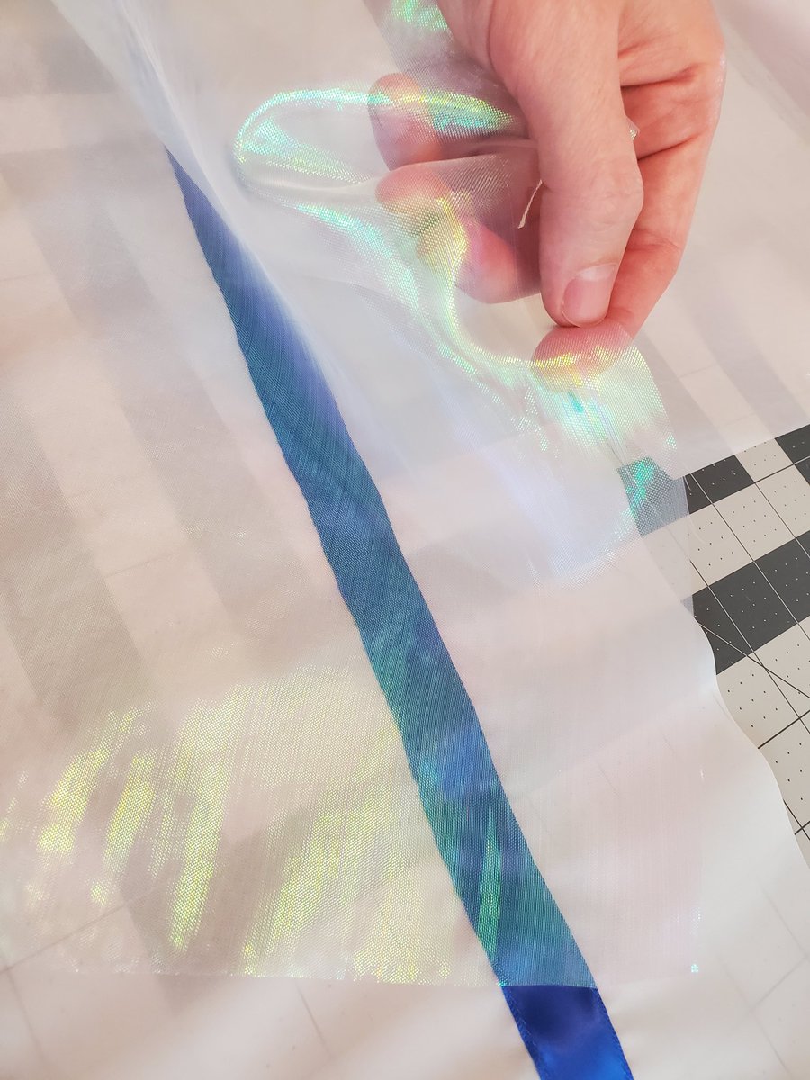 voymay's tweet image. Bit of a pain trying to layer iridescent/holographic organza over white nylon ripstop BUT I'm trying to make the synchronize 🎼 outfit to extra shiny ✨️