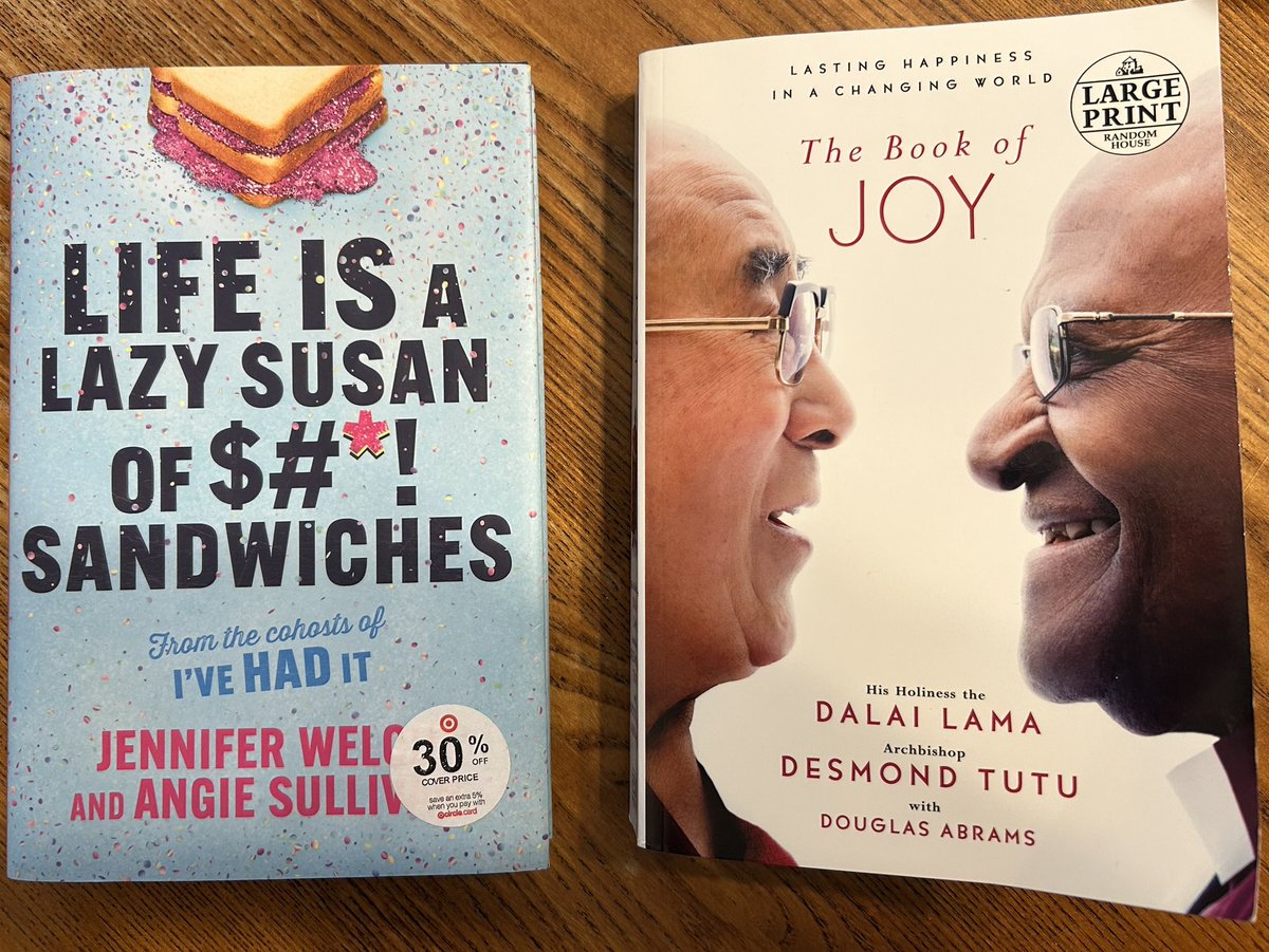My wife is bouncing between these two books. I wonder which one will prevail.