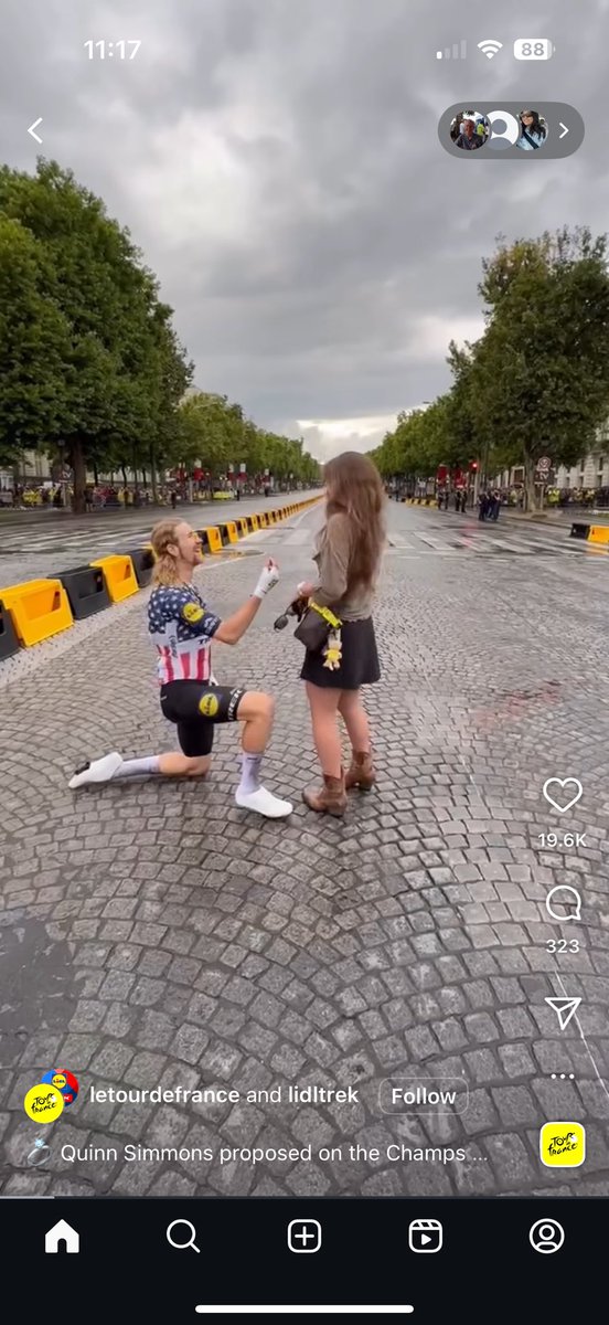 Quinn Simmons proposing on the last day of the Tour de France - well done Quinn.