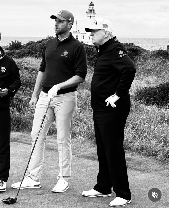 President Trump with son Eric on the golf course in Scotland.