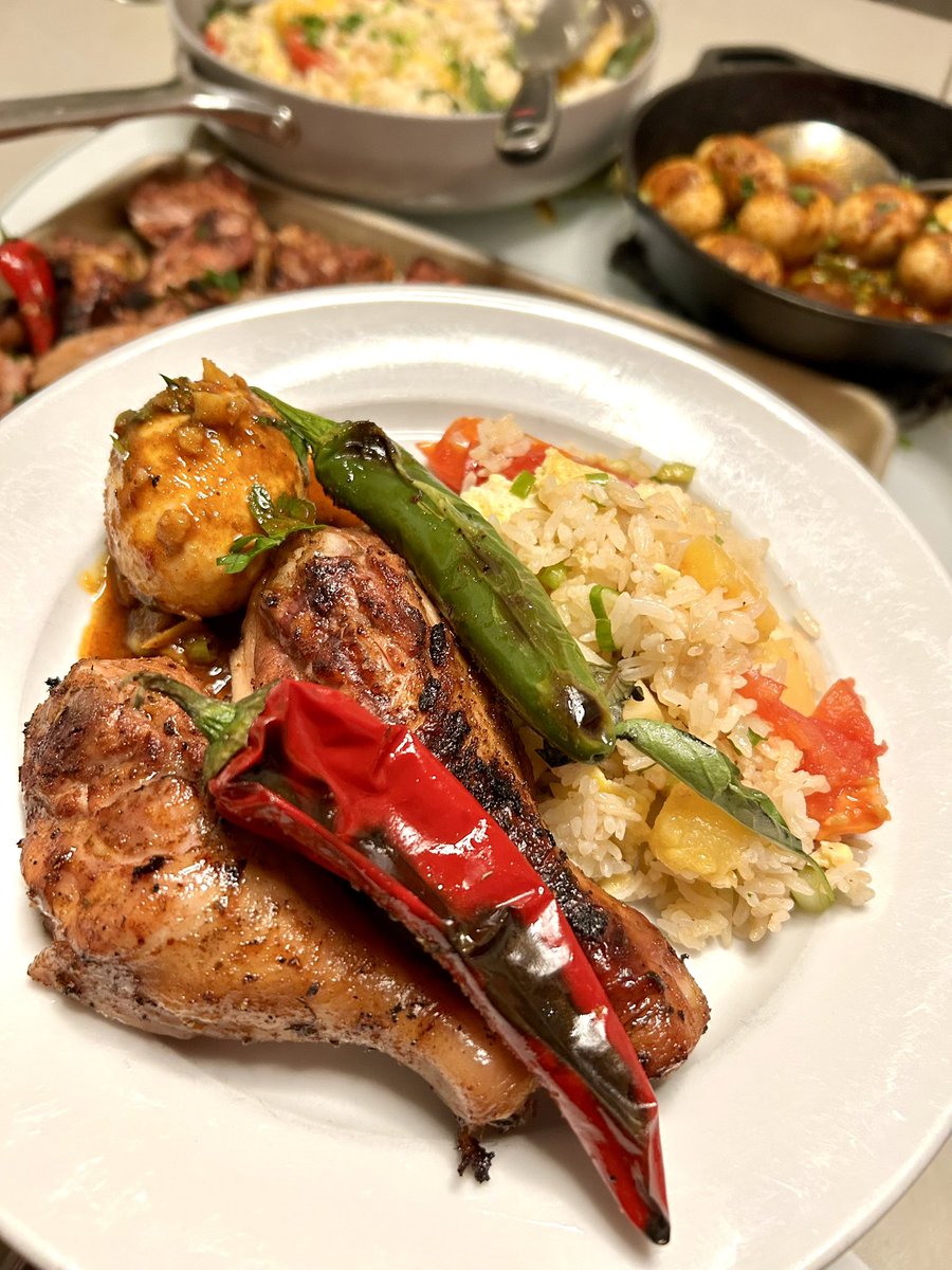 whatkenatetoday's tweet image. Spread and plates. Did a little Cajun-Asian thing. Soy marinated drumsticks with @FireHatchRubs’ Cajun Kicker. Thai fried rice and Cajun boiled eggs. Spicy chiles.