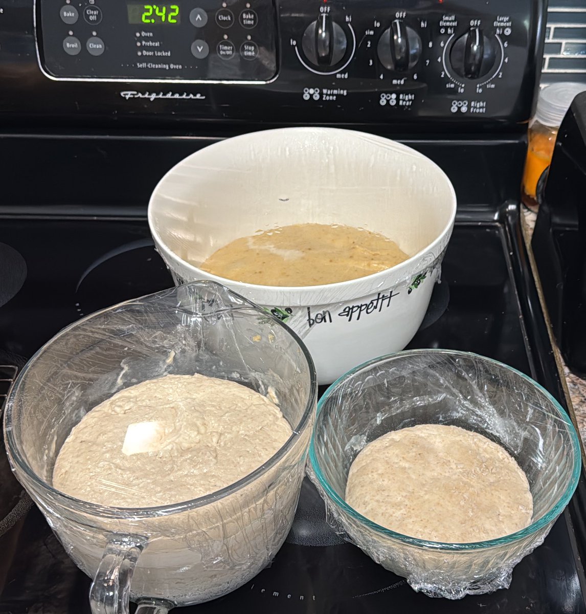 _donutninja's tweet image. Busy day playing w/dough. Brioche loaf (left), rye/wheat/white sandwich loaf (right), Maritozzi dough almost ready, waffle batter fermenting, stiff starter for honey buns getting bubbly. Goimg to AL tomorrow for the week to help w/grandbaby & dog. Setting up my guys with goodies.