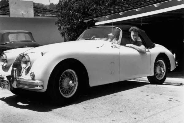 JagmansM's tweet image. Clint Eastwood with his Jaguar XK150, at his home in Sherman Oaks, Los Angeles, CA - 1961