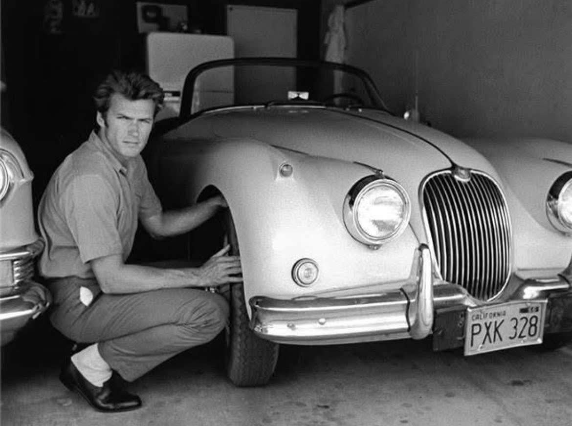 JagmansM's tweet image. Clint Eastwood with his Jaguar XK150, at his home in Sherman Oaks, Los Angeles, CA - 1961