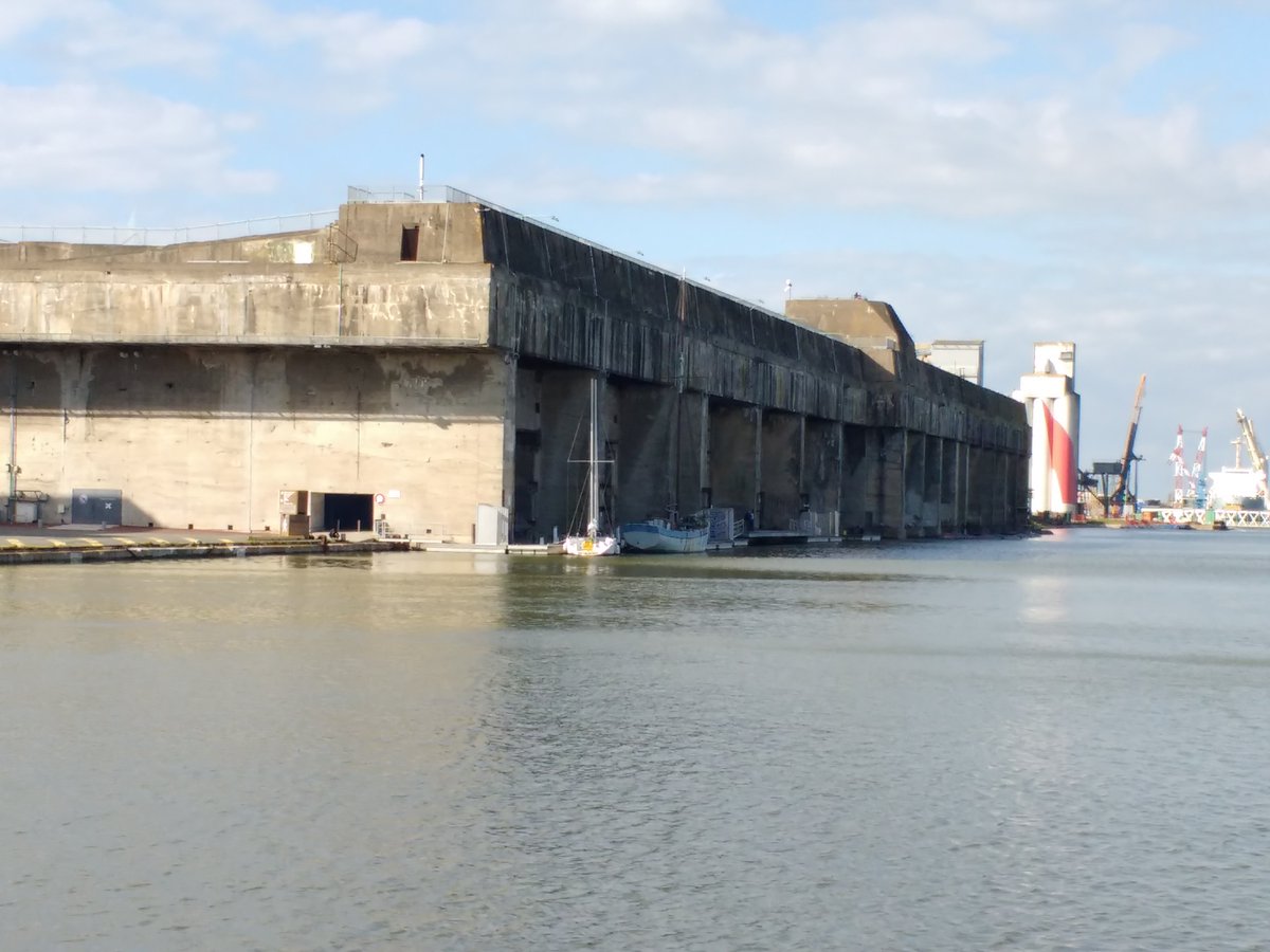 PeterNunn3's tweet image. Some years back, we visited the former U-boat pens in Saint Nazaire, France. Incredible structure, still with a totally forbidding atmosphere. 

This insta post reminded me of that day: 
instagram.com/reel/DMiyF1do2…