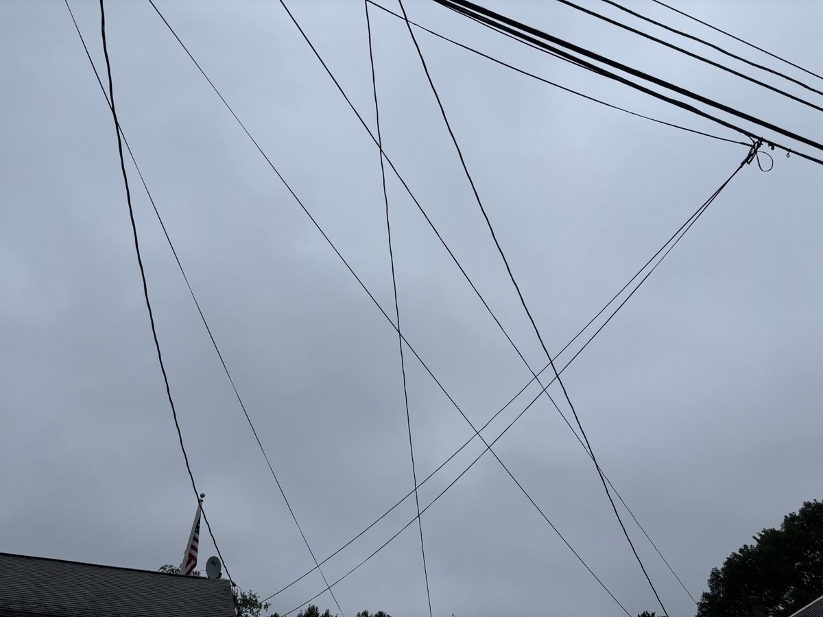 sub__tara's tweet image. What happened to the future being wireless? Are we moving backwards? Massachusetts looks like a third world country these days. 
Edited to add: These are shots of tiny residential neighborhoods in our town of 10k. It’s everywhere and more keeps being added.