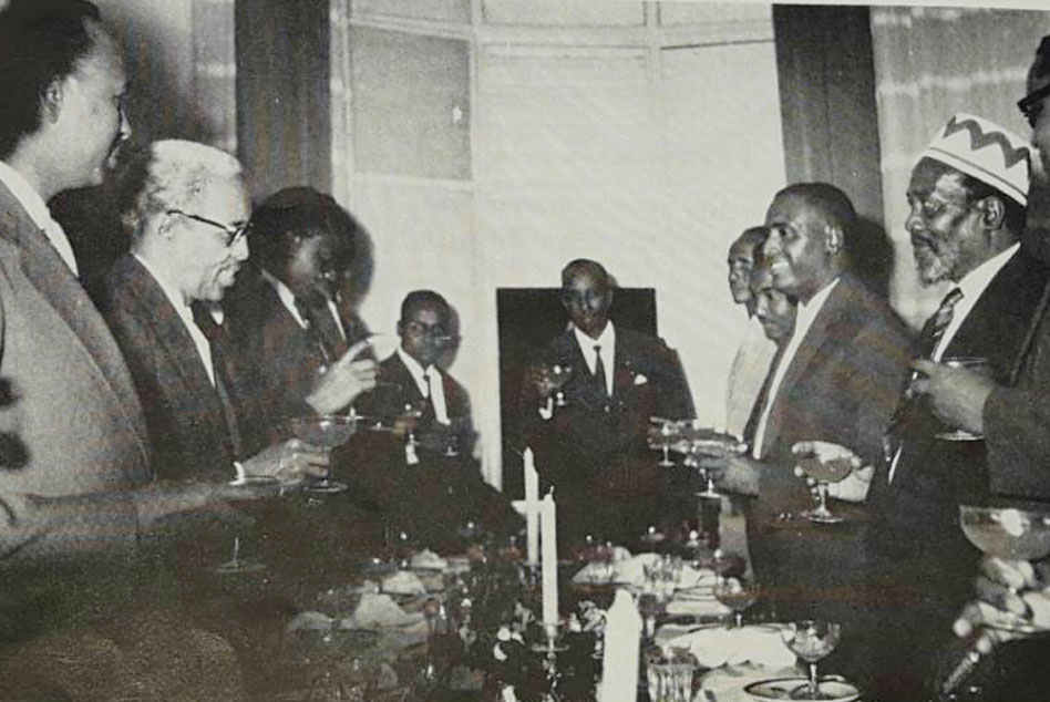 Somalia's inaugural president, Adam Abdulle Osman, hosts and offers a toast to Jomo Kenyatta (the leader of KANU, a freedom-fighting party, and the future first Kenyan president), during the latter's official visit to Mogadishu in 1962.