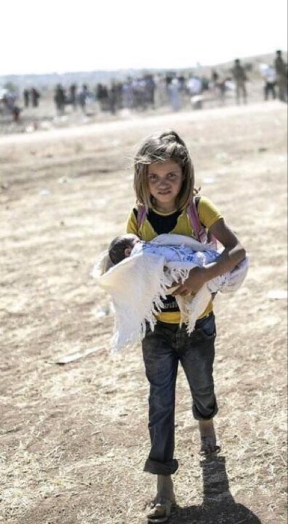 A Yezidi child carrying her sister and escaped to mountains to be starved without food and water by ISIS.

media care? No
UN care ? No
anyone protest? No