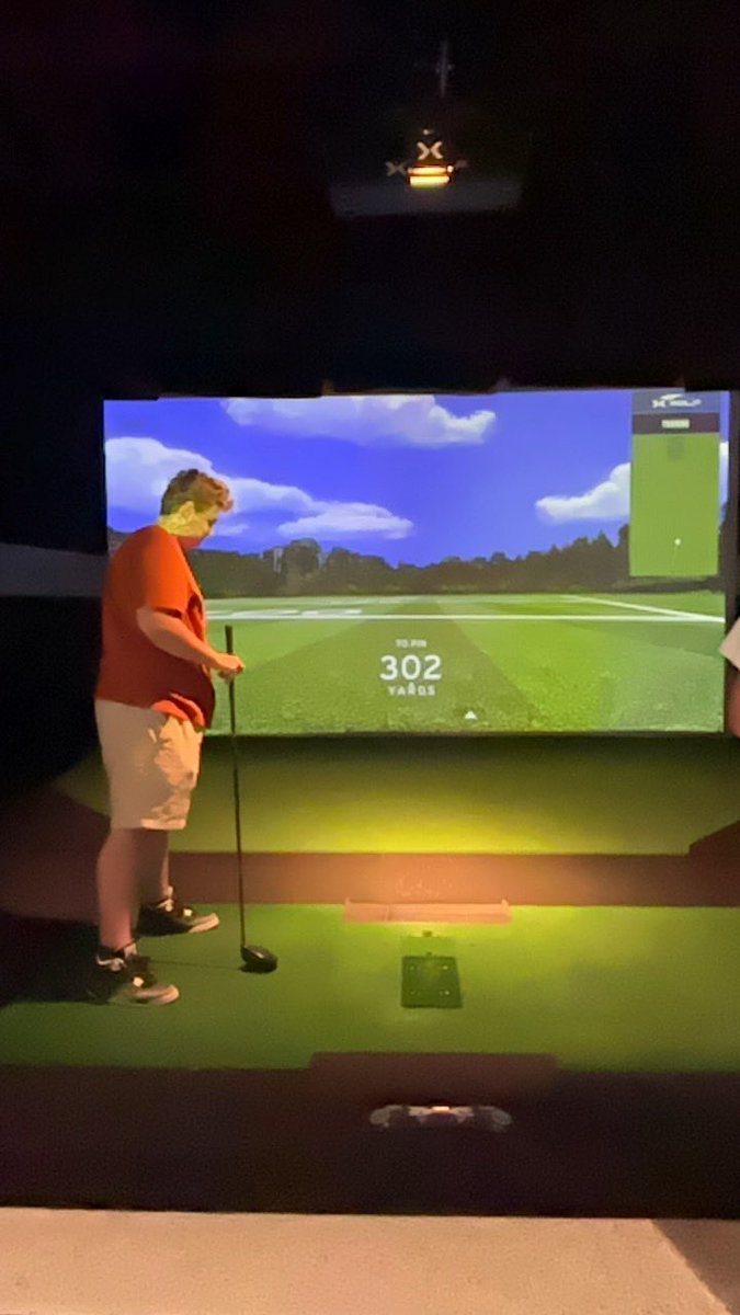 Watched my son doing some indoor golfing just starting to golf