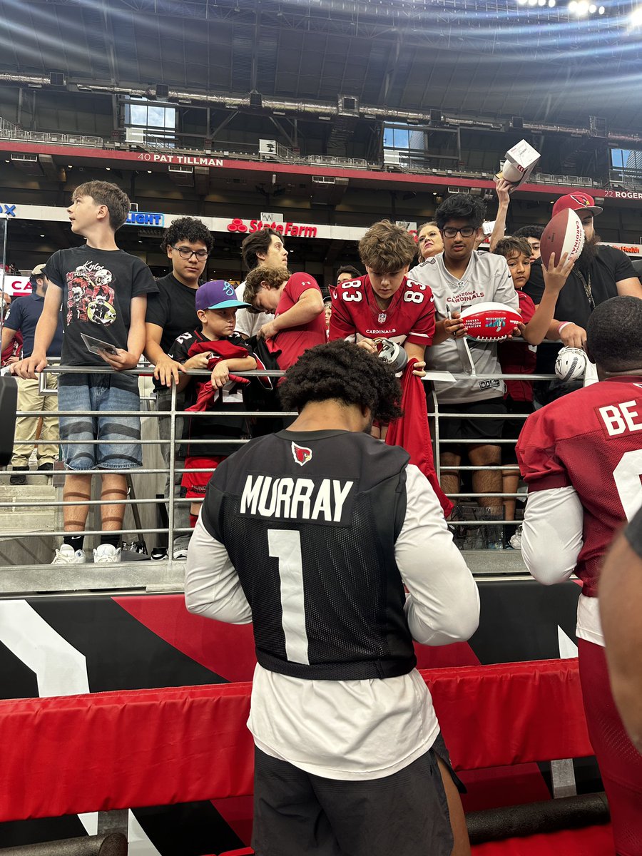 theo_mackie's tweet image. Kyler getting some love from the fans after practice