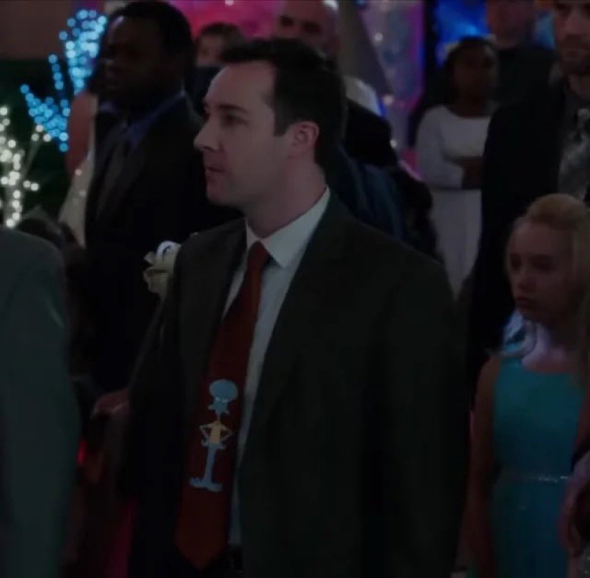 koreybruhyt's tweet image. in the movie daddy’s home there is a guy at the school dance who has a png of squidward on his tie