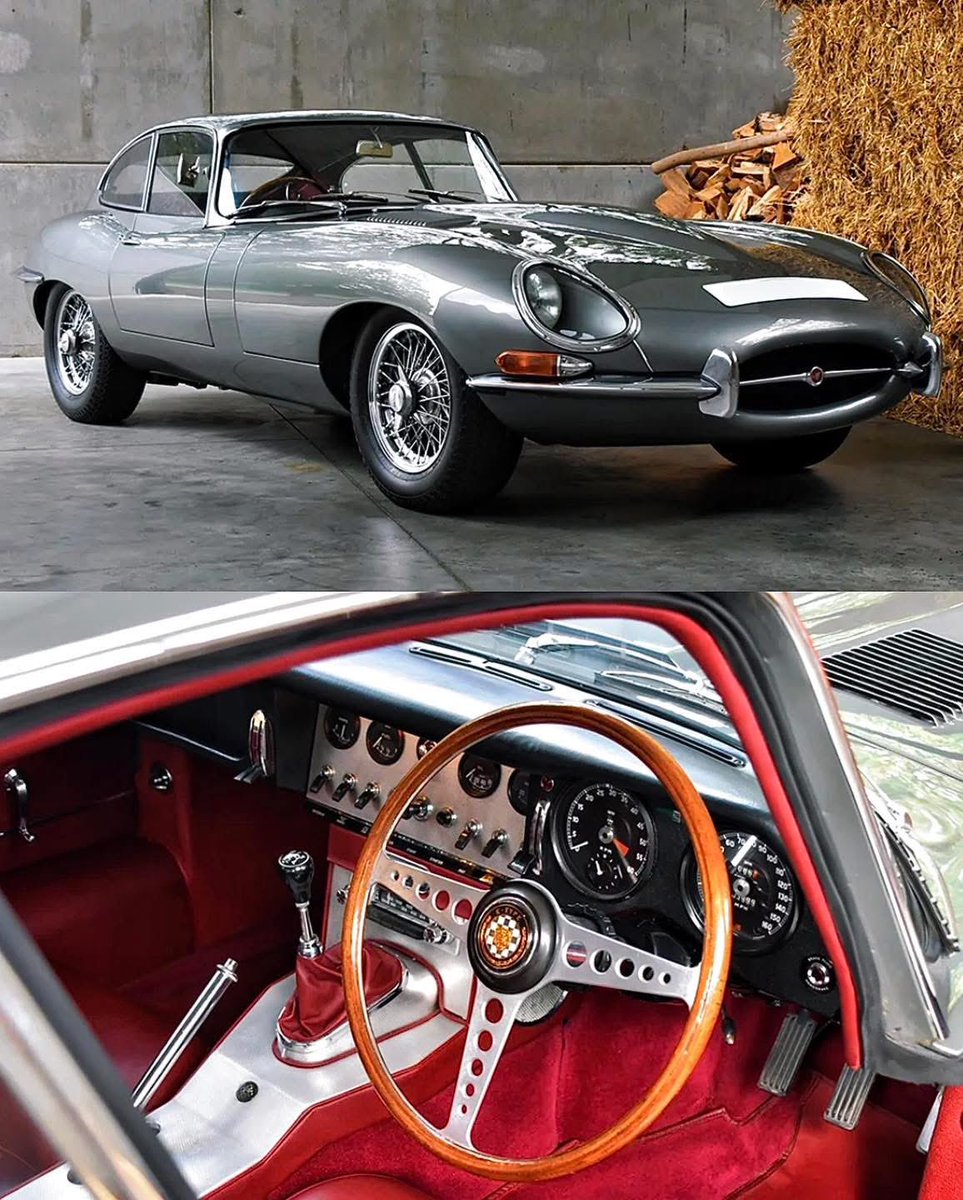 JagmansM's tweet image. A wood-rimmed wheel and exposed metal console give this Jag a sporty aviation flair.